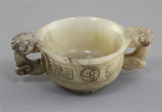 A Chinese white, grey and black veined jade two handled cup, 16th / 17th century, width 11.5cm
